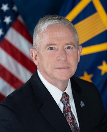 Acting Director Christopher Holly