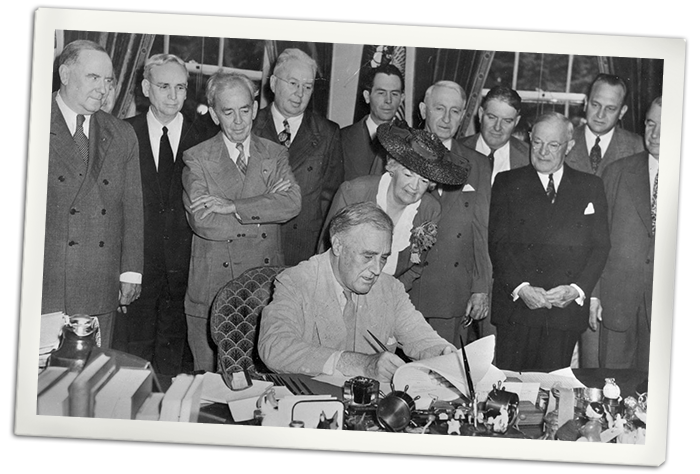 Franklin D. Roosevelt signing the GI Bill